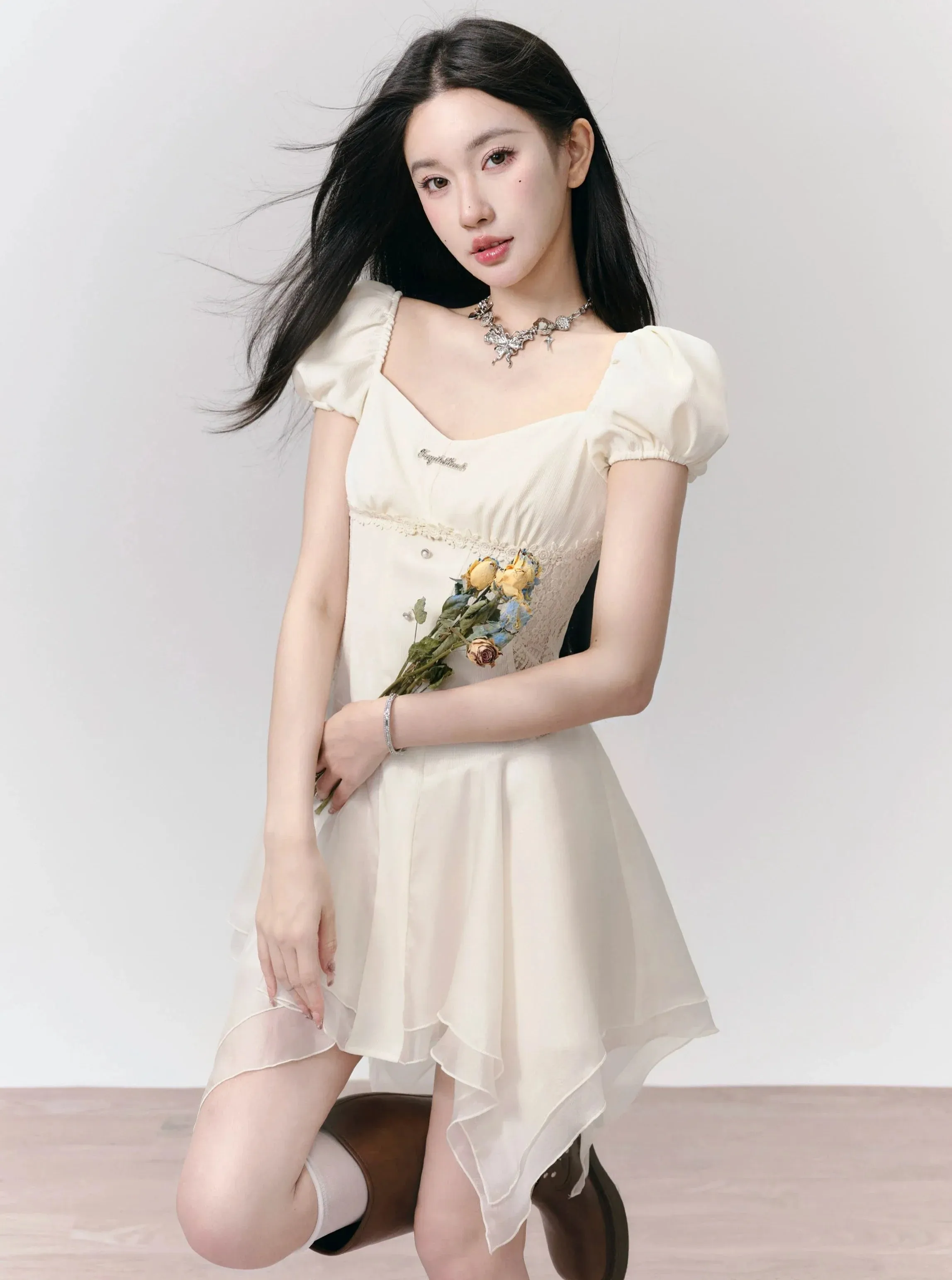 Romantic White Puff Sleeve Mini Dress - Corset-Style Bodice with Handkerchief Hem